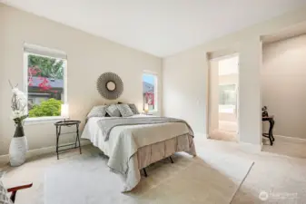 The ensuite bathroom has a huge walk-in closet area with privacy restroom