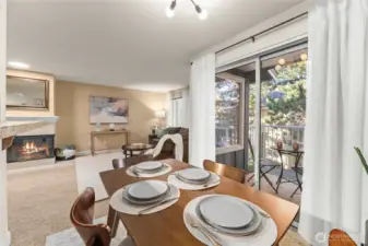 Dining room opens up to living room and private deck