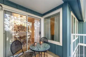 Deck is usable year round and looks out onto mature trees