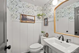 One of the most charming powder rooms you’ll see, filled with unique character and charm.