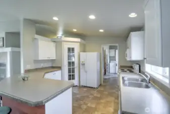 kitchen, view from dining. fridge and pantry