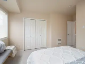 Main Bedroom graced by vaulted ceilings, large closets, and territorial views. Photo shows Unit B (MLS 2276317) with reversed identical floor plan.