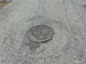 Sewer to West up street on 128th St E