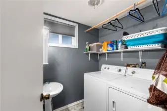 Lower level utility room & 3/4 bath.