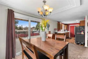 Trayed ceilings over dining area.