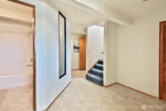 The lower level offers a full bath and two bonus rooms.