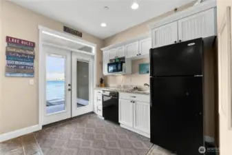 wet bar with french doors to beach