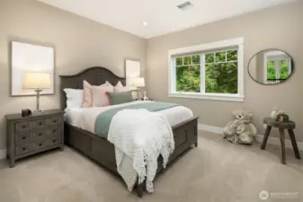 Guest bedroom #2 on the upper level with ensuite Jack and Jill bath.