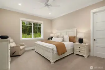 Main level Primary Suite with large walk in closet and beautiful backyard views.