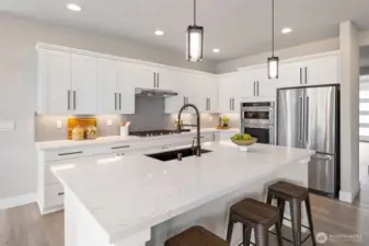 Photos are of a home in a different community and are for illustration purposes only to reflect typical finishes.  May depict seller enhancements.  Colors and options may vary.