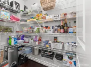 The walk-in pantry offers additional storage space!