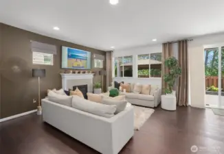 A cozy gas fireplace, designer-inspired paint and window coverings are featured in the main living areas!
