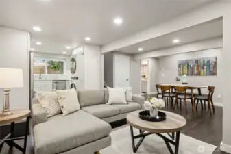 Lower-level view from the media room to the 2nd kitchen, dining area & 2nd laundry with LG Wash-tower...