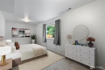 Downstairs bonus room that can be easily used for 5th bedroom. Virtually staged