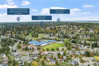 Conveniently located near schools, parks, and shopping, this home offers easy access to Tiffany Park (0.3 miles), Cascade Park (0.6 miles), and Fairwood Shopping Center (2.1 miles). Aerial view highlights the neighborhood’s walkability and surrounding amenities.