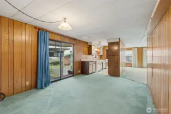 Here is the family room w/a view of the kitchen.
