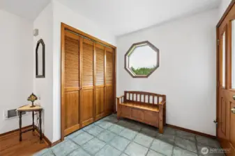 Formal entryway with garage access.