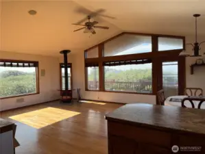Spacious great room concept with great views and a large, covered deck! Hardwood floors!