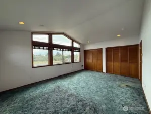 A whole wall of closets in the primary suite!