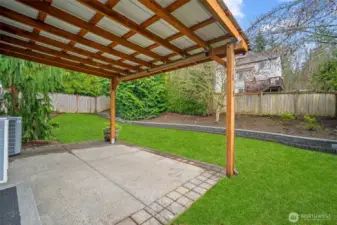Covered backyard patio, perfect for year-round outdoor entertaining and relaxing.