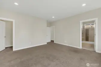 1 of 2 Walk-In Closets in Primary Ensuite