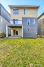 Easily maintained backyard with mature plantings for privacy