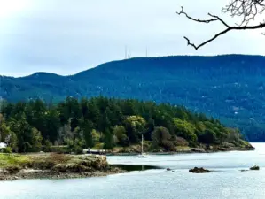 Looking to the east. Public dock located on Madrona Point with Mount Constitution as a backdrop. Protected Indian Island to the left in foreground.