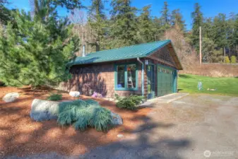 Garage has plenty of room for your cars and your toys.