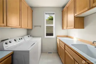 Main level utility room.