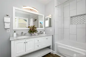 Primary bath on main with granite and luxury finishes