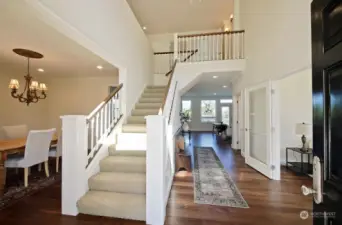 As you step inside the foyer, the Dining Room is to your left, Sitting Room to your right, 3/4 bath also to your right beyond the sitting room. Straight ahead to the open Living Room & Kitchen.