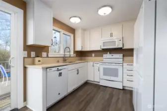 Kitchen with updated cabinetry and flooring