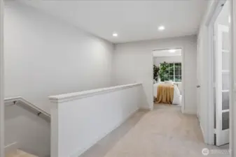 Spacious hallways throughout provide breadth and space.