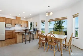 Bright & spacious kitchen & dining area all with incredible views.