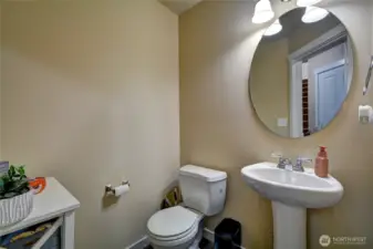 1/2 bath conveniently located on the main level for guests.