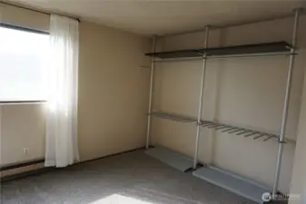 Open closet system with space for a dresser or desk