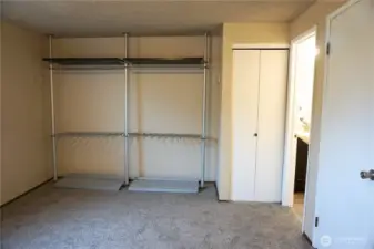 Bedroom also has an enclosed closet as well as separate access to the bathroom