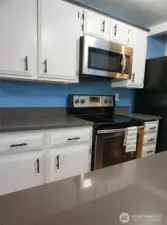 Light and bright renovated kitchen with Quartz countertops