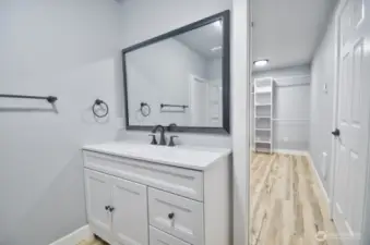 Large walk in closet off primary bathroom