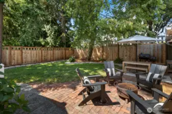 Outside there is a brick patio that was built with bricks from the chimney that was removed from the house.
