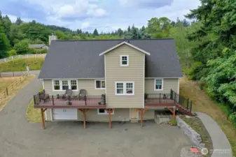 The back of the home has that classic farmhouse look, very nice.