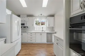 Newer appliances included: refrigerator, dishwasher, oven, microwave and cooktop