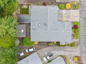 Overhead view shows the storage building and covered patio