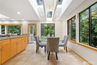 Inside to Outside living at its best...step outside to lovely deck for your morning coffee.