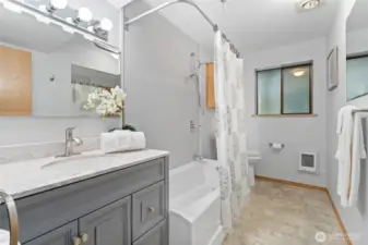 Updated Full Bath on lower level, marble vanity and large tub for soaking or showers.