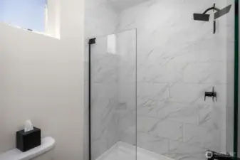 Master, en-suite bathroom with attached walk in closet