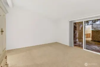 Primary with sliding doors to patio