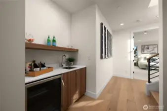 3rd level wet bar with beverage fridge and sink.
