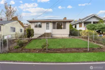 Welcome home to this delightful & turnkey rambler, the perfect blend of classic charm, comfort & convenience nestled in the heart of Beacon Hill. Step inside to find all new interior paint, sparkling refinished oak hardwood floors & beautiful natural light that create a warm & inviting feel throughout home. Home features three sizable bedrooms, full bath, spacious living room, open dining & kitchen, offering plenty of space for living & relaxing. Newer 2023 roof, fully-fenced lot & convenient gravel driveway parking pad off alley access. Centrally located, you’re minutes from popular local restaurants & cafes, parks, great schools, public transportation & easy I-5 freeway access. Cute, cozy, & functional - this gem is ready for you to call home! (Grass digitally enhanced)