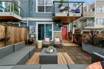 Great end unit craftsman style townhome. West facing fenced patio with gated entry to the front door.